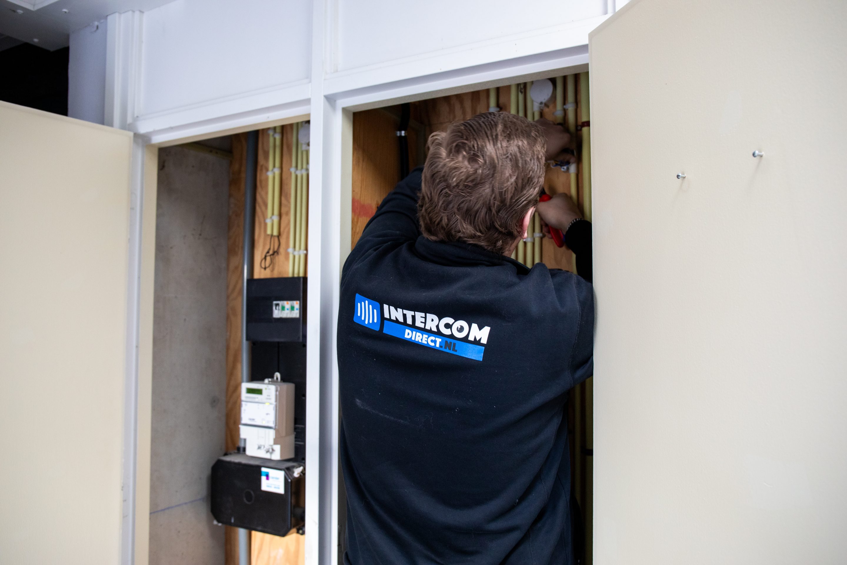 IntercomDirect monteur aan het werk bij project Amsterdam